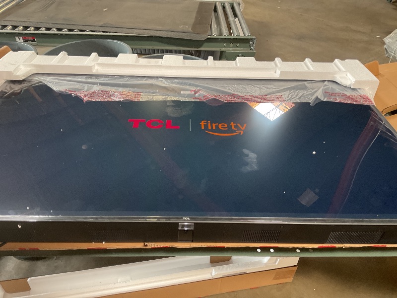 Photo 1 of ** screen cracked see pictures**TCL 65 inch Q series smart TV ultra wide color gambit 4K ultra HD resolution Dolby Vision HDR Dolby Atmos motion rate 120 Bluetooth personal audio auto game mode three HDMI inputs fire TV