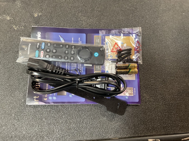 Photo 1 of *BROKEN ONLY FOR PARTS Panasonic W95 Series 65-inch Mini LED 4K Ultra HD Smart Fire TV, Sport Stadium Mode, ATSC3.0, Dolby Vision IQ, Dolby Atmos, HDR10+ Adaptive, Press and Ask Alexa, 144Hz, Wall-mountable - 65W95AP