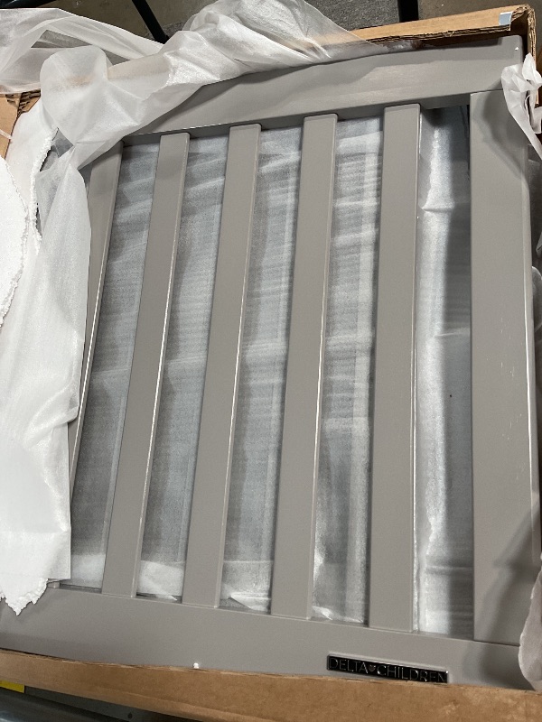 Photo 1 of Delta Children Essex 4-in-1 Convertible Baby Crib, Grey with Natural Legs
