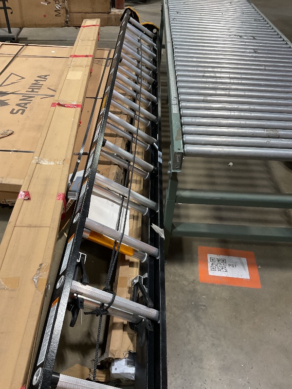 Photo 1 of 24 ft. Fiberglass Extension Ladder Type 1A 300 lbs.