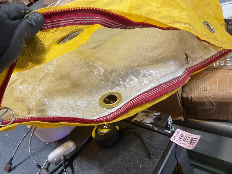Photo 1 of **DIRT DAMAGE **Yellow nylon bag. 34*25 inches