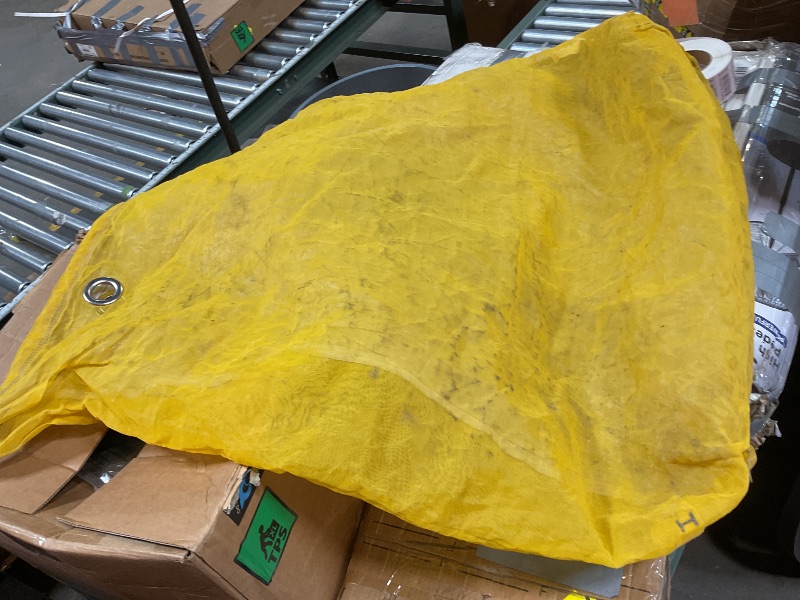 Photo 1 of **DIRT DAMAGE **Yellow nylon bag. 34*25 inches
