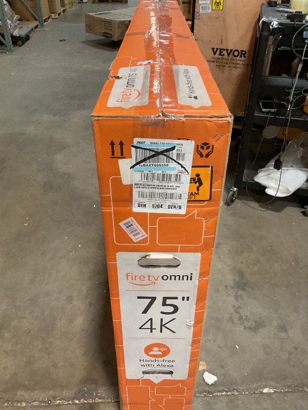 Photo 1 of **SELLING FOR PARTS. NO REMOTE. NO TV STANDS**Introducing Amazon Fire TV 75" Omni Series 4K UHD smart TV, hands-free with Alexa - R