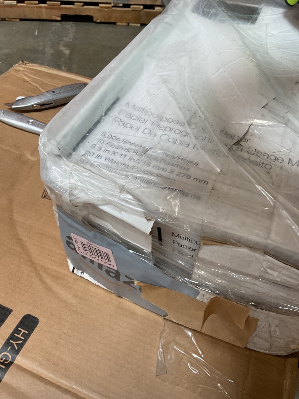 Photo 1 of **6 REAMS. Some opened and crumbled **Amazon Basics Multipurpose Copy Printer Paper, 20 lb, 8.5 x 11 Inches, 10 Reams (5,000 Sheets), 92 Bright, White