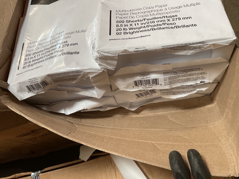 Photo 1 of **6 REAMS. Some opened and crumbled **Amazon Basics Multipurpose Copy Printer Paper, 20 lb, 8.5 x 11 Inches, 10 Reams (5,000 Sheets), 92 Bright, White