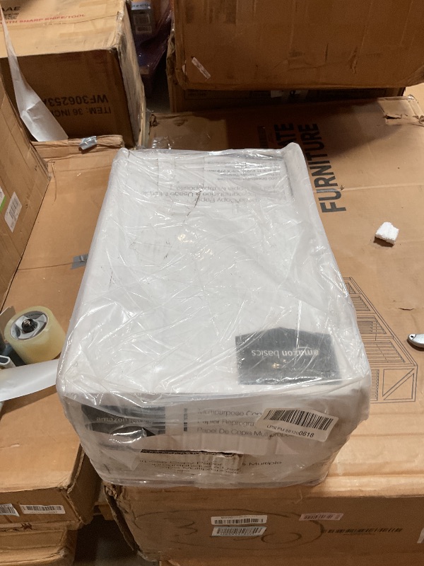 Photo 1 of **6 REAMS. Some opened and crumbled **Amazon Basics Multipurpose Copy Printer Paper, 20 lb, 8.5 x 11 Inches, 10 Reams (5,000 Sheets), 92 Bright, White