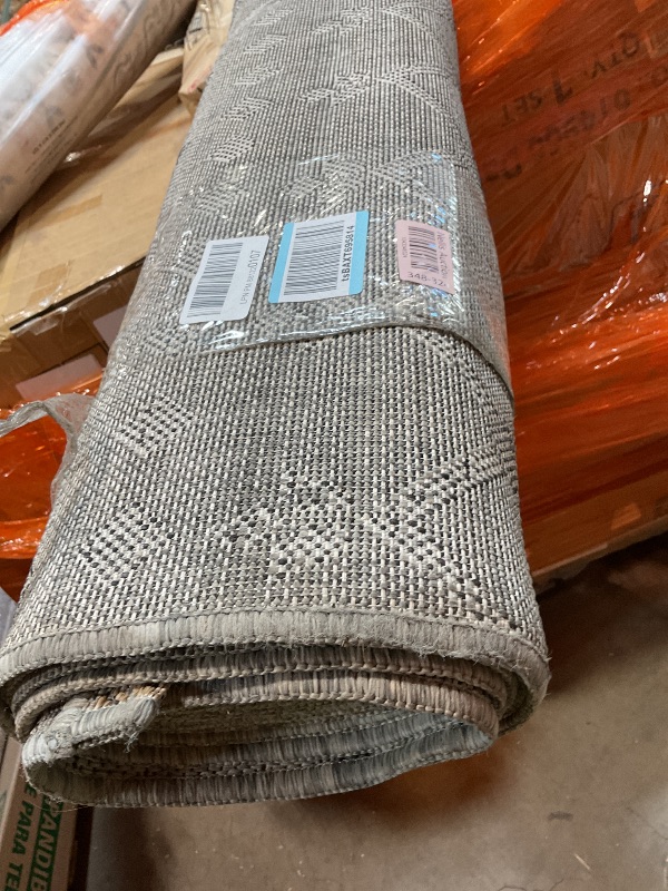 Photo 1 of **DIRTY FROM TRANSPORT **Large floor rug . 8ft wide. Length unknown