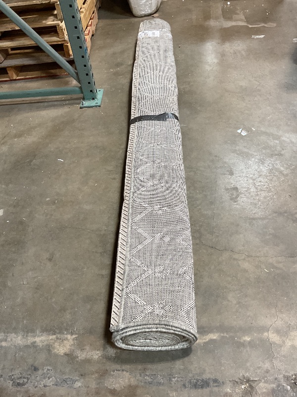 Photo 1 of **DIRTY FROM TRANSPORT **Large floor rug . 8ft wide. Length unknown