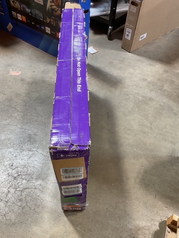 Photo 1 of **MAJOR DAMAGE TO SCREEN. NO REMOTE. NO TV LEG STANDS. SELLING FOR PARTS** Roku Smart TV 2025 – 40-Inch Select Series, 1080p Full HD TV – RokuTV with Voice Remote – Flat Screen LED Television with Wi-Fi for Streaming Live Local News, Sports, Family Entert