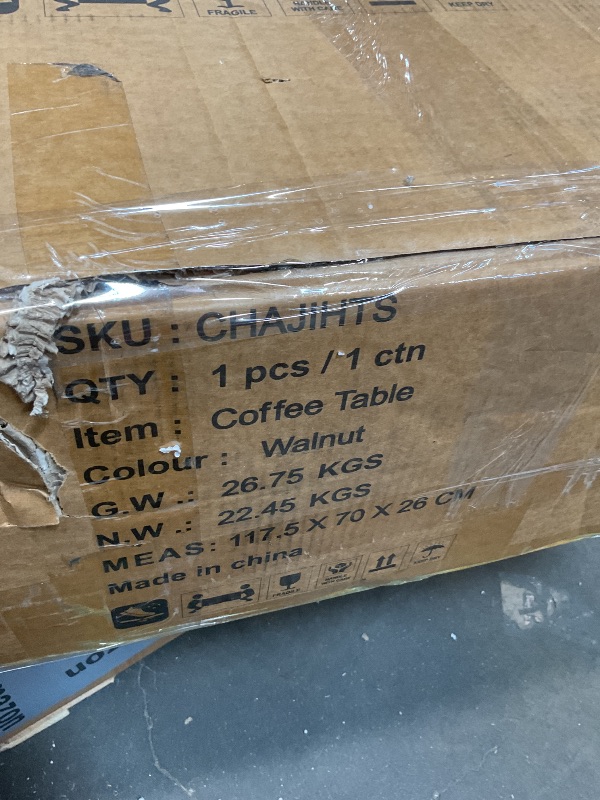 Photo 1 of **MINOR DAMAGE TO LIP**Coffee table. Color-WALNUT.