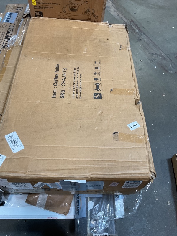 Photo 1 of **MINOR DAMAGE TO LIP**Coffee table. Color-WALNUT.