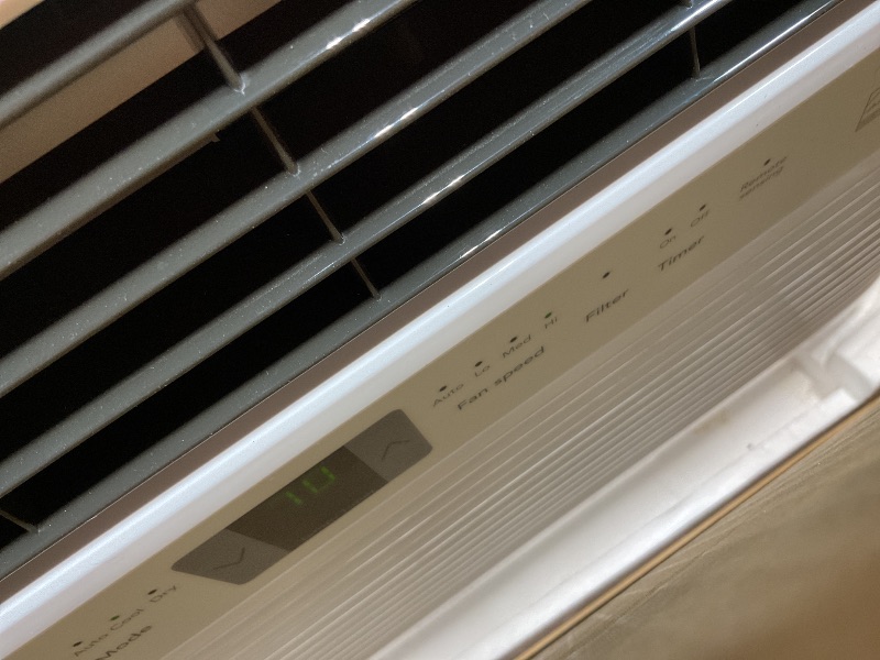 Photo 1 of **SOME DIRT**Frigidaire 6,000 BTU Window Air Conditioner & Dehumidifier, 115V, Cools up to 250 Sq. Ft. for Apartment, Dorm Room & Small/Medium Rooms, with Remote Control, Programmable Timer, and Sleep Mode, White