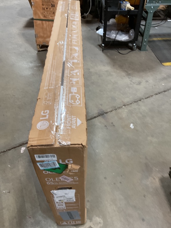 Photo 1 of **MAJOR DAMAGE TO SCREEN. SELLING FOR PARTS AS PARTIAL SET **LG 65-Inch Class OLED evo AI 4K C5 Series Smart TV w/Dolby Atmos, Dolby Vision, HDR10, AI Super Upscaling 4K, Filmmaker Mode, Wow Orchestra, Alexa Built-in (OLED65C5PUA, 2025)