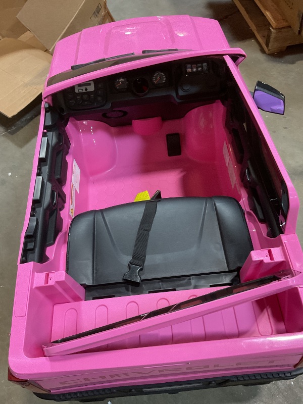 Photo 1 of **MINOR WEAR USE. LOW BATTERY .NO CHARGER**Chevrolet Silverado 12V Kids Boys and Girls Electric Ride on Truck Car Electric Vehicle Jeep with Parents Remote Control, 2 Speeds, 4 Wheels, LED Lights, Music (Pink)