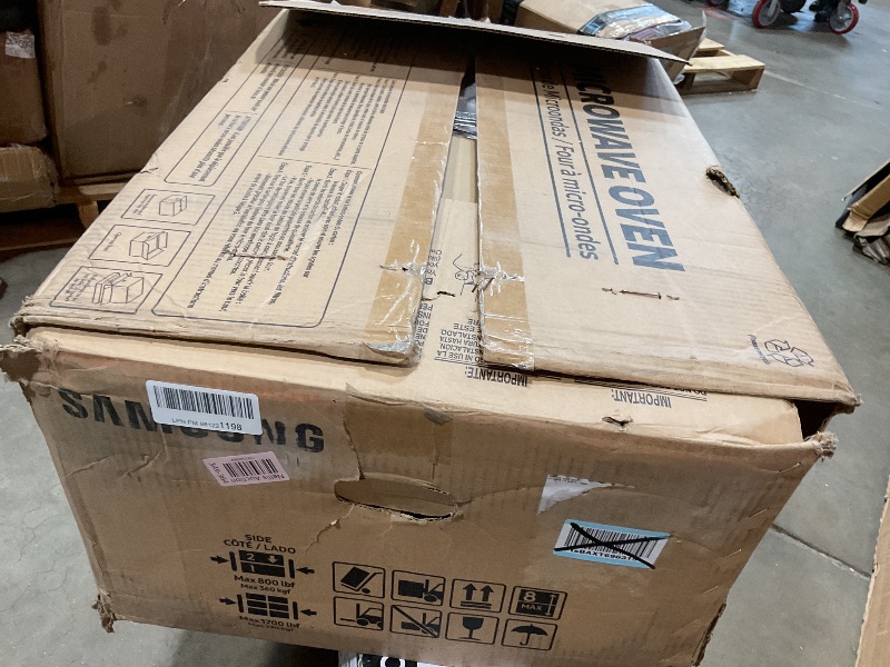 Photo 1 of **DENTED ON ALL SIDES**  SAMSUNG 1.1 Cu Ft Smart SLIM Over the Range Microwave Oven w/ 550 CFM Hood Vent, Wi-Fi, Voice Control, LED Light Bar, Sensor Cook, 1100 Watt, ME11A7710DS/AA, Fingerprint Resistant Stainless Steel