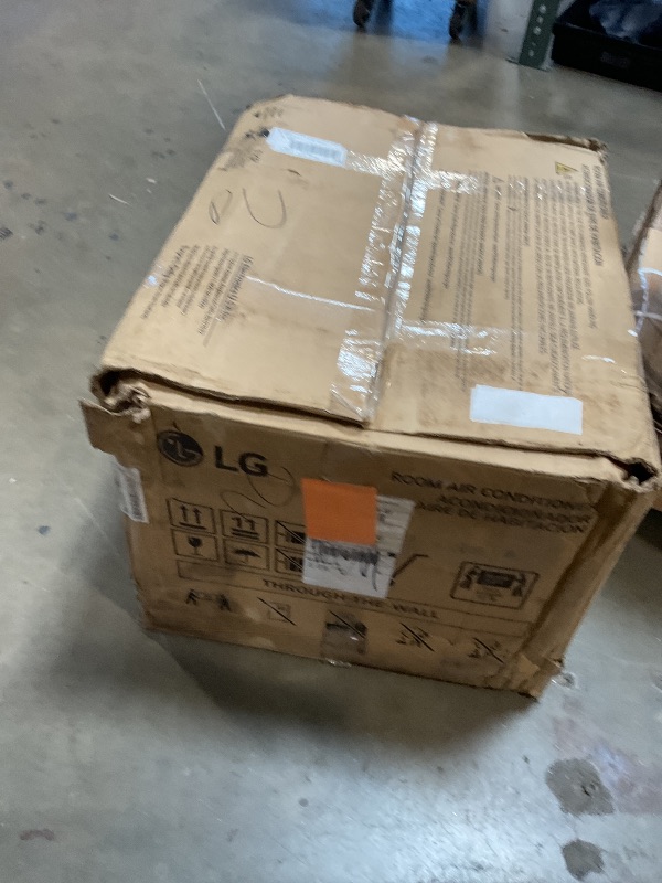 Photo 1 of **MINOR DAMAGE TO BACK CORNER OF FRAME**LG 11,800 BTU Through the Wall Air Conditioner, 115V, Cools up to 530 Sq. Ft. for Bedroom, Living Room, Apartment, with Remote, 3 Cool & Fan Speeds, Universal design fits most sleeves, White