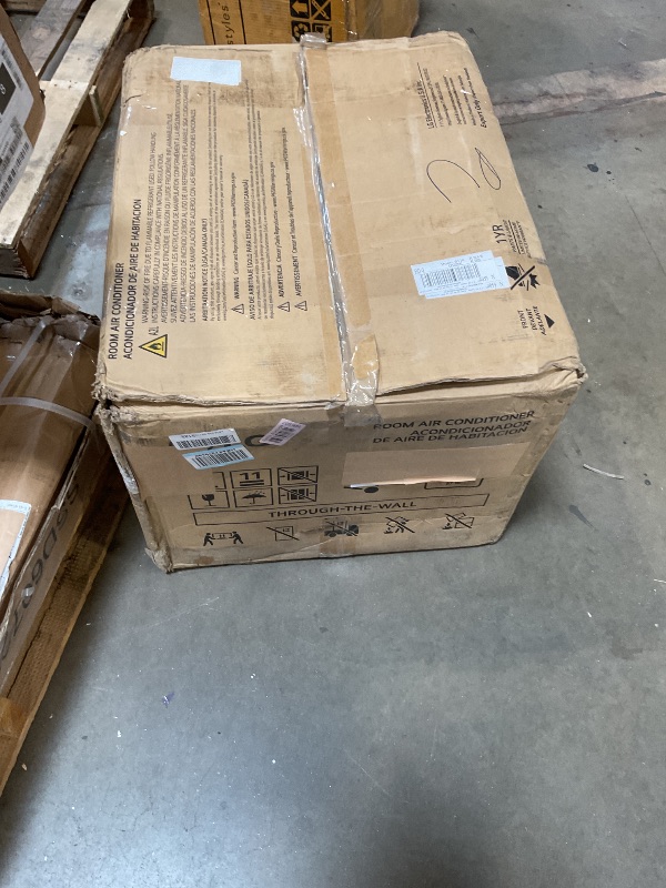 Photo 1 of **MINOR DAMAGE TO BACK CORNER OF FRAME**LG 11,800 BTU Through the Wall Air Conditioner, 115V, Cools up to 530 Sq. Ft. for Bedroom, Living Room, Apartment, with Remote, 3 Cool & Fan Speeds, Universal design fits most sleeves, White