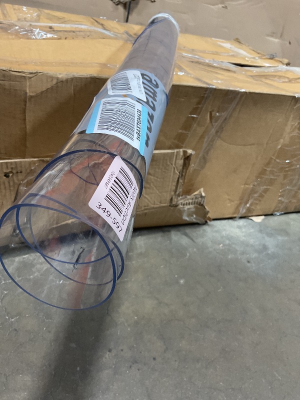 Photo 1 of **DIRT AND SCUFFS**Deep Dream 2.0mm Thick 62 Inch Clear Round Table Cover & Protector for Dining & Office