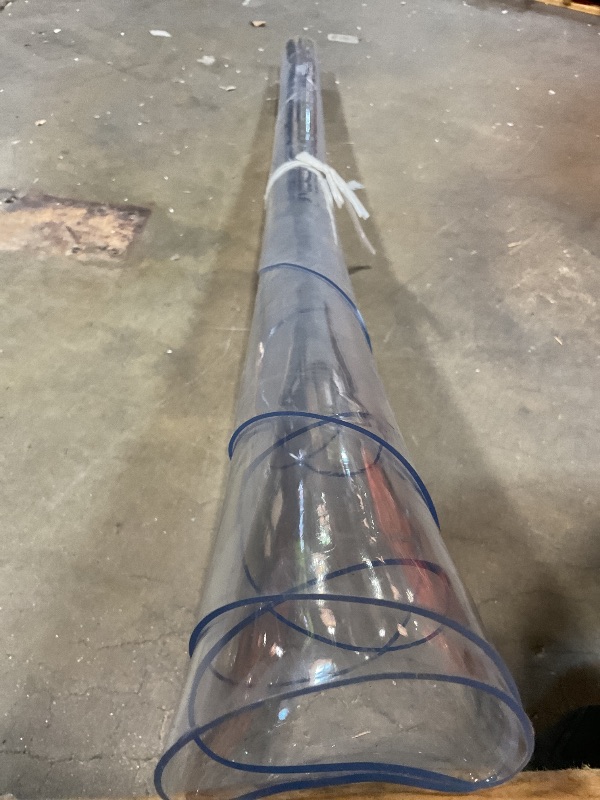 Photo 1 of **DIRT AND SCUFFS**Deep Dream 2.0mm Thick 62 Inch Clear Round Table Cover & Protector for Dining & Office