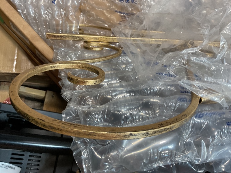 Photo 1 of **BAD PAINT JOB**Deco 79 Metal Scroll Display Easel Extra Large Adjustable 3 Tier Floor Standing Easel with Chain Support, Display Stand 23" x 33" x 68", Gold