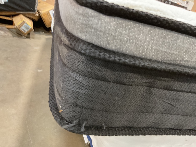 Photo 1 of **DIRT AND TEAR DAMAGE FROM TRANSPORT**Mubulily queen size mattress