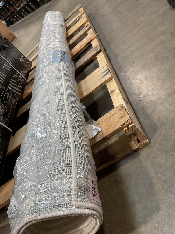 Photo 1 of **DIRT FROM TRANSPORT **JONATHAN Y Haze Solid Low-Pile Ivory Indoor Area Rug 8x10, Coastal,Bohemian,Minimalist,Classic, Easy-Cleaning for Living Room,Bedroom,Kitchen,Pet Friendly,Non-Shedding (SEU100T-8)