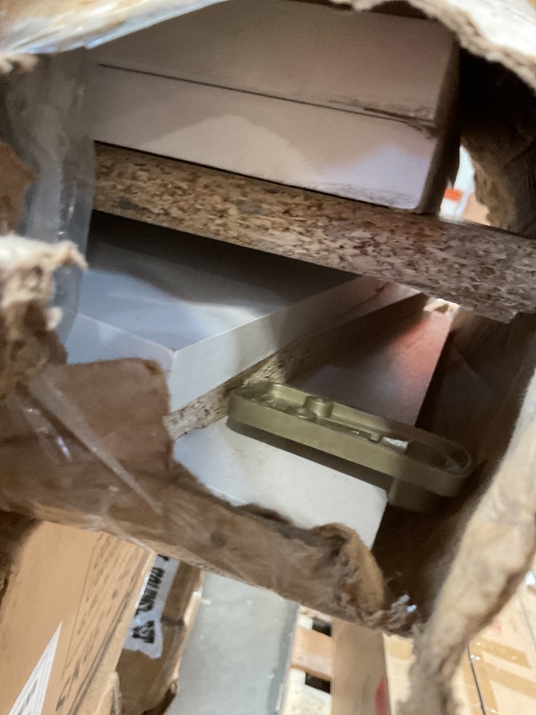 Photo 1 of **SELLING FOR PARTS**Box of Cabinet or shelf parts.