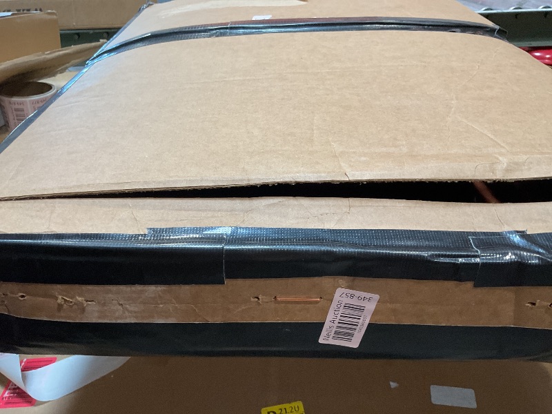 Photo 1 of **MINOR USE WEAR**Shock and strut assembly. Part number 041-312550. For year and make unknown