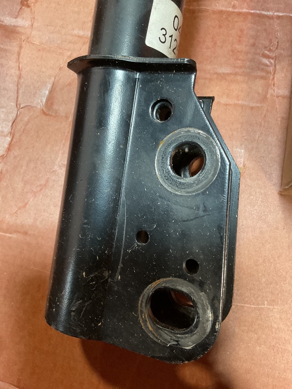Photo 1 of **MINOR USE WEAR**Shock and strut assembly. Part number 041-312550. For year and make unknown