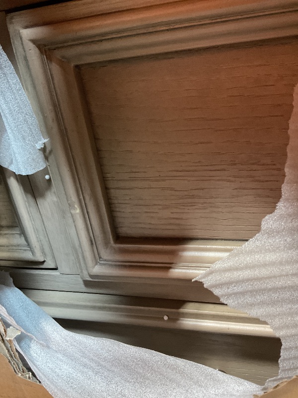 Photo 1 of **MINOR SCRAPE DAMAGE 3 Spots**Signature Design by Ashley Blairhurst Traditional 10-Drawer Dresser with Felt-Lined Top Drawer and Safety Stop, Gray & Light Brown