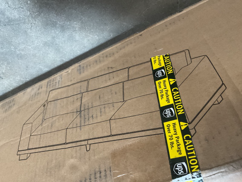 Photo 1 of **2 BOXES**Three seat couch