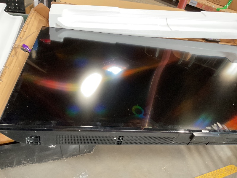 Photo 1 of **NO POWER CORD. CANNOT TURN ON Roku Smart TV – 65-Inch Select Series 4K HDR RokuTV with Roku Enhanced Voice Remote