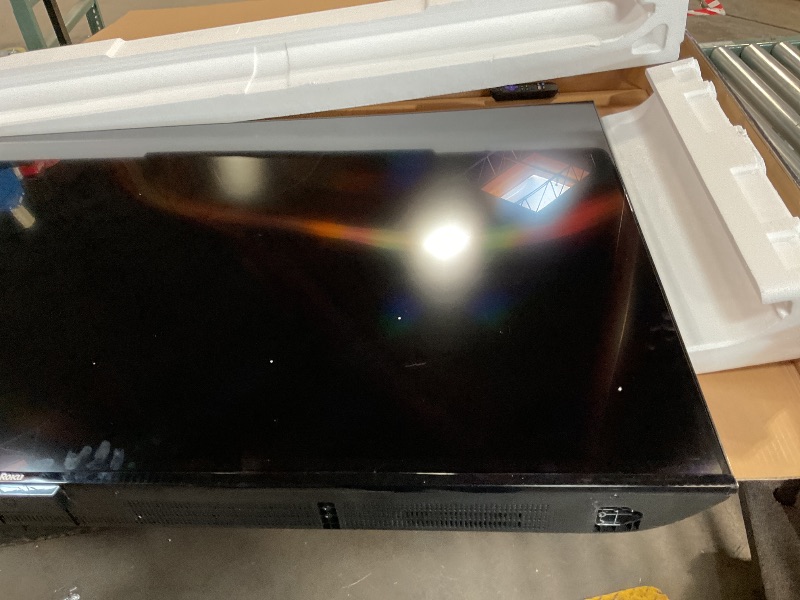 Photo 1 of **NO POWER CORD. CANNOT TURN ON Roku Smart TV – 65-Inch Select Series 4K HDR RokuTV with Roku Enhanced Voice Remote