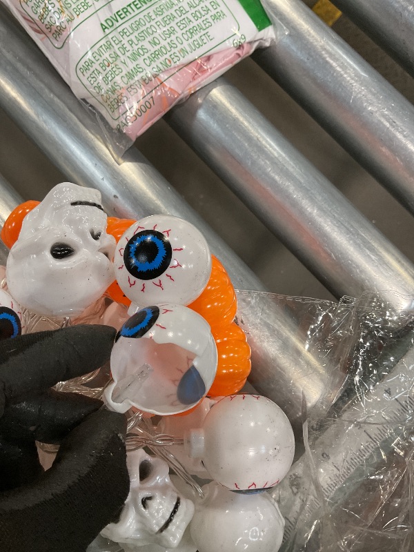 Photo 1 of **A COUPLE SHELL PIECES BROKE**Halloween Pumpkin String Lights, 16.4FT 20 LED Pumpkin Lights for Halloween Decorations, 2 Mode Battery Operated, Orange Jack-O-Lantern Fairy Lights for Fall, Party, Porch, Tree(3 color Mix B Series)