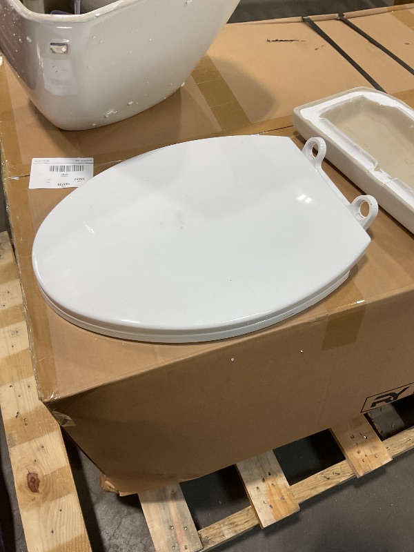 Photo 1 of **TOILET LID / SEAT/ AND COVER ONLY**
 ADA 17.9” High Toilet for Bathrooms, 1000g Map High-Efficiency, 12" Rough-In