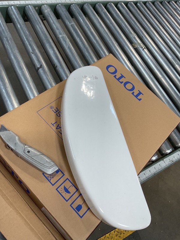 Photo 1 of **ONLY THE TANK, LID, AND TOILET SEAT ARE HERE**
**REFER TO PICTURES **
Aquia IV Arc 2-Piece 0.9/1.28 GPF Dual Flush Elongated ADA Comfort Height Toilet in Cotton White SoftClose Seat Included