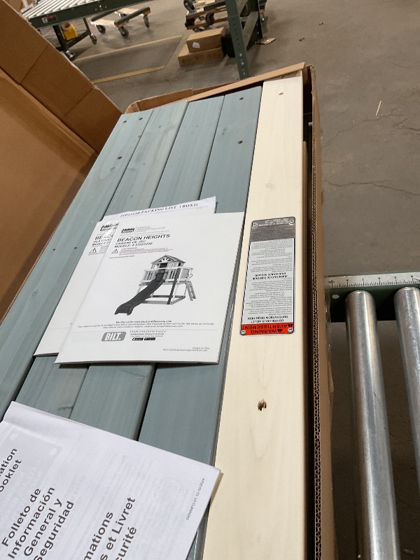 Photo 1 of 
Here till like two or three he got one more pallet of large after thisBackyard Discovery Beacon Heights Elevated Cedar Wooden Kids Playhouse with Wave Slide, Play Kitchen, Wrap-Around Deck, Flat-Step Ladder, Half Door, Windows, Bell, and Growth Chart for