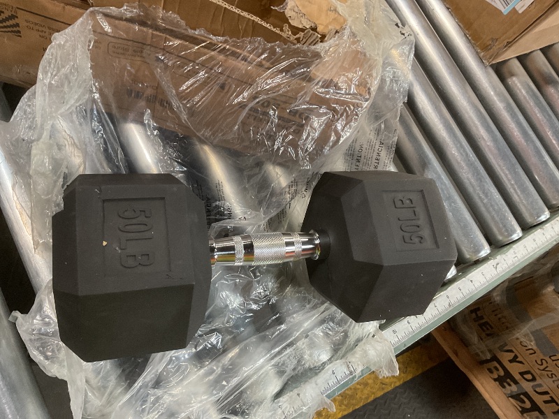 Photo 1 of 50 lb dumbbell
