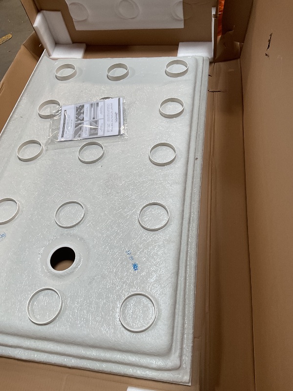 Photo 1 of **AS PICTURED**
DreamLine® SlimLine 60"W x 36"D White Threshold Shower Base 
