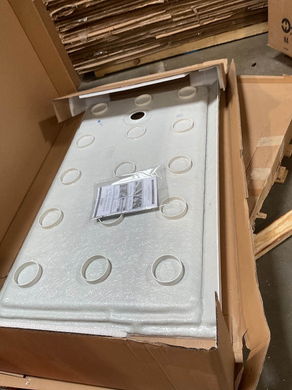 Photo 1 of **AS PICTURED**
DreamLine® SlimLine 60"W x 36"D White Threshold Shower Base 
