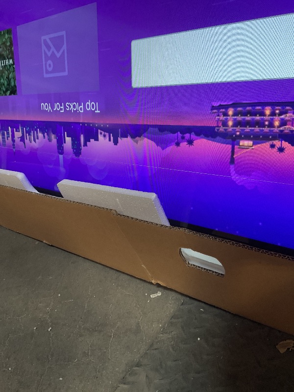 Photo 1 of **LINE THROUGH TOP OF SCREEN**Roku Smart TV – 65-Inch Select Series 4K HDR RokuTV with Roku Enhanced Voice Remote, Brilliant 4K Picture, Automatic Brightness, & Seamless Streaming – Live Local News, Sports, Family Entertainment