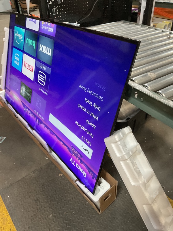 Photo 1 of **LINE THROUGH TOP OF SCREEN**Roku Smart TV – 65-Inch Select Series 4K HDR RokuTV with Roku Enhanced Voice Remote, Brilliant 4K Picture, Automatic Brightness, & Seamless Streaming – Live Local News, Sports, Family Entertainment
