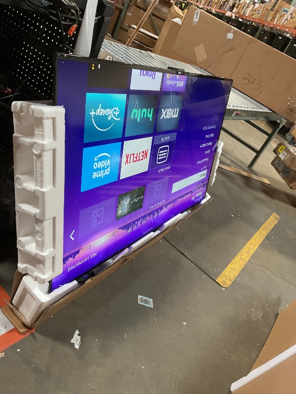Photo 1 of **LINE THROUGH TOP OF SCREEN**Roku Smart TV – 65-Inch Select Series 4K HDR RokuTV with Roku Enhanced Voice Remote, Brilliant 4K Picture, Automatic Brightness, & Seamless Streaming – Live Local News, Sports, Family Entertainment