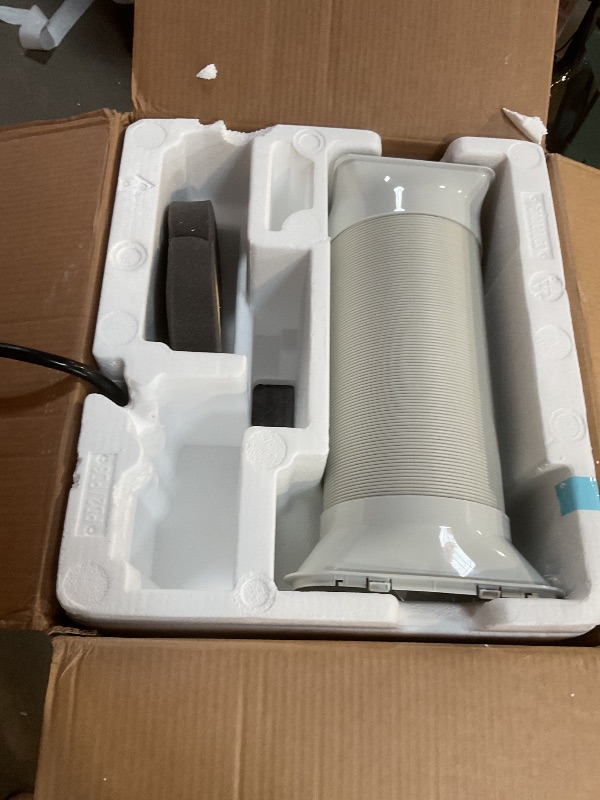 Photo 1 of 10,000 BTU Portable Air Conditioner Cools 450 Sq. Ft. with Dehumidifier and LCD Remote in White