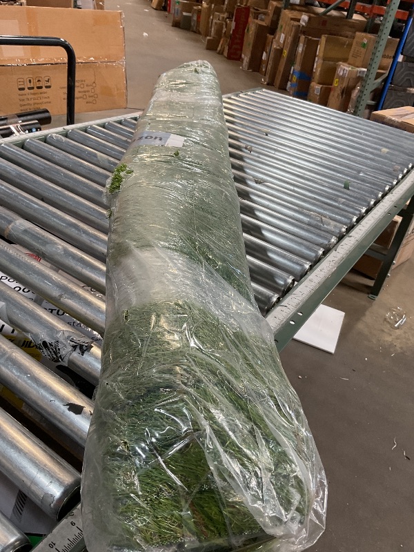 Photo 1 of 80 inch length fake grass. Width unknown 