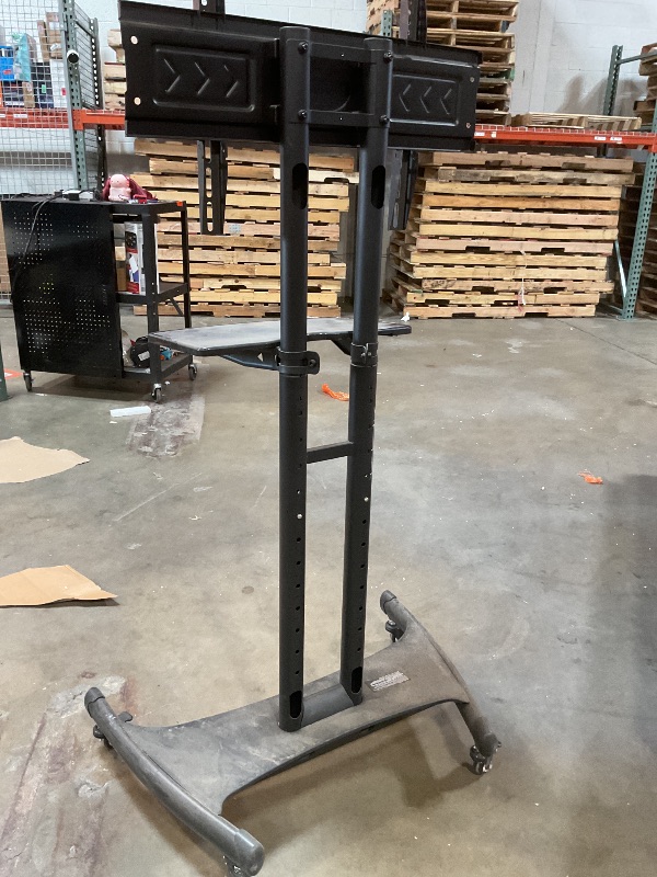 Photo 1 of  ** MISSING HARDWARE LIKE 2 BOLTS**LUXOR FP2500 Adjustable-Height LCD/LED TV Stand + Mount, 40" to 60" Screen Size TVs, Stand 32.75"W x 28.75"D x 46.5" to 62.5"H, Four 2" Nylon Casters, All with Locking Brakes