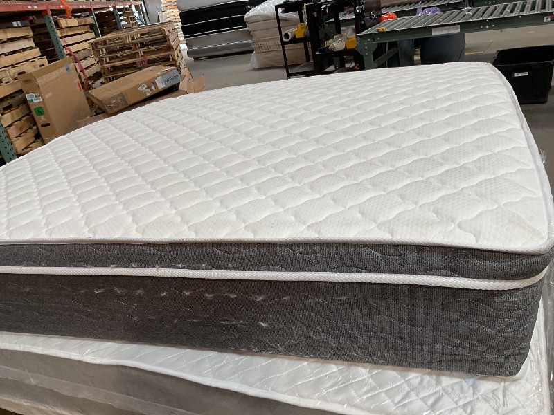 Photo 1 of **DIRTY FROM TRANSPORT**Set the stage for a good night’s sleep with this medium plush hybrid mattress with edge support. It is crafted using a six-layer combination of pocket coils and gel memory foam and features a medium firmness with low motion transfe