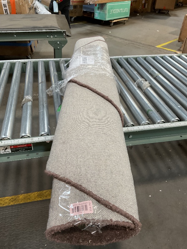 Photo 1 of 5’x8’Dark brown entry Rug