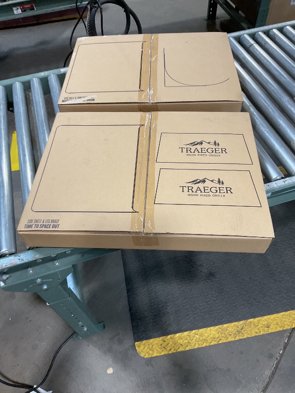 Photo 1 of **SELLING FOR PARTS** TRAEGER WOOD FIRED GRILLS PARTS. Left and right sides