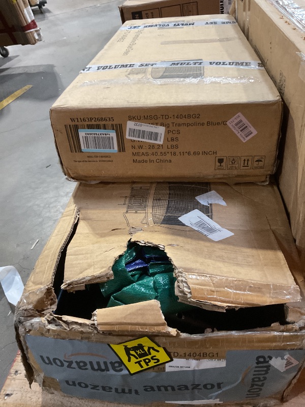 Photo 1 of **2 BOXES**14 foot big trampoline blue green
